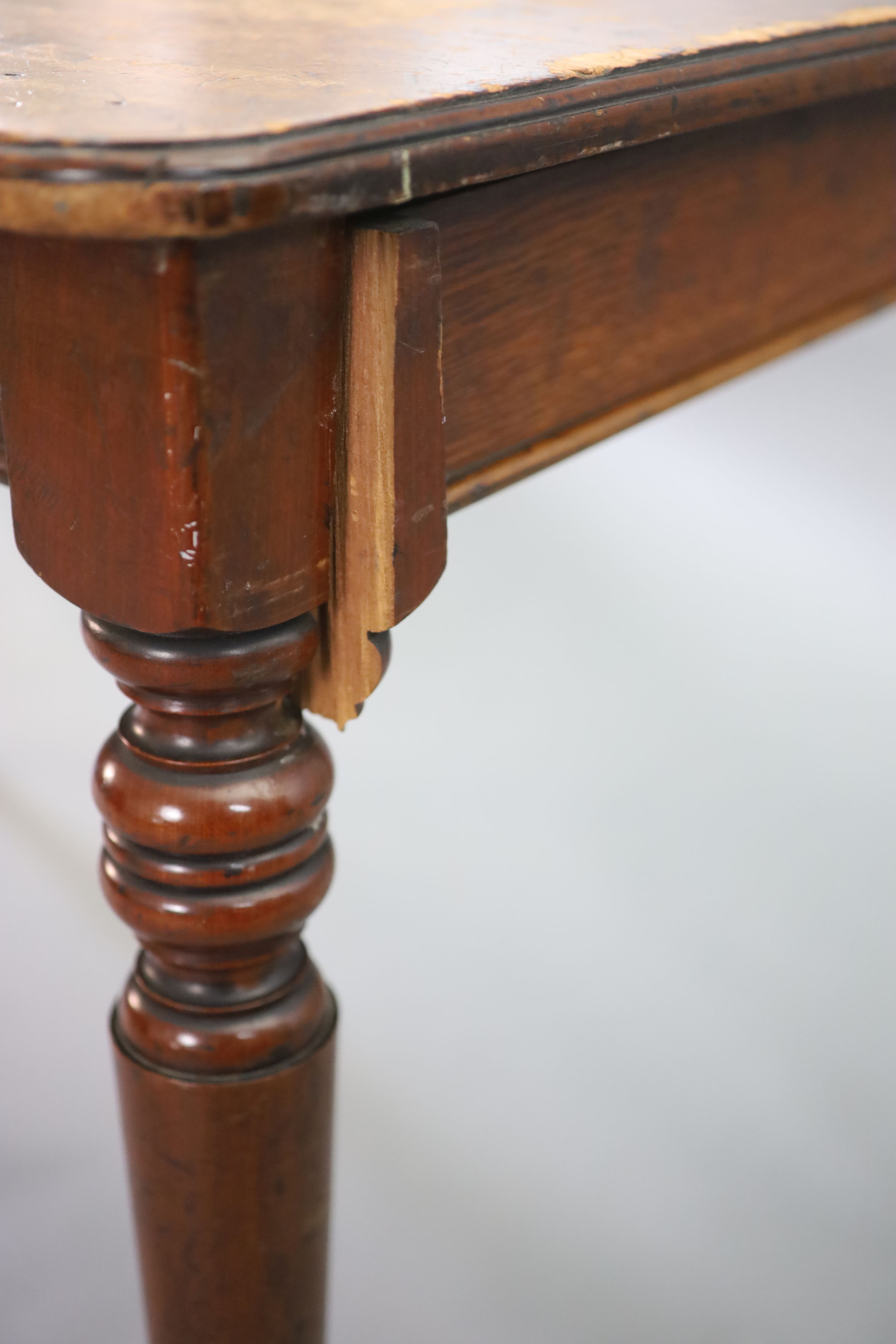 A pair of late Victorian mahogany writing tables, W.112cm D.68cm H.77.5cm